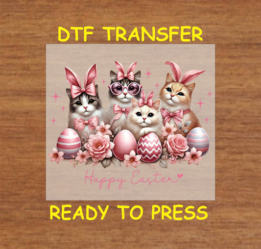 Four kittens with bunny ears, pink bows, and Easter eggs.