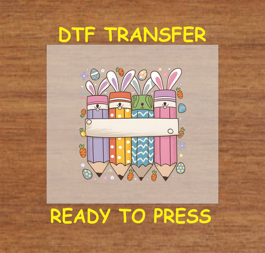 Easter Bunny Pencil DTF transfer with colorful pencils wearing bunny ears, pastel patterns, and blank banner for customization.