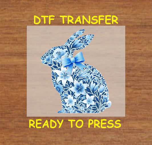 Blue floral bunny silhouette DTF transfer with intricate flowers and a matching bow.