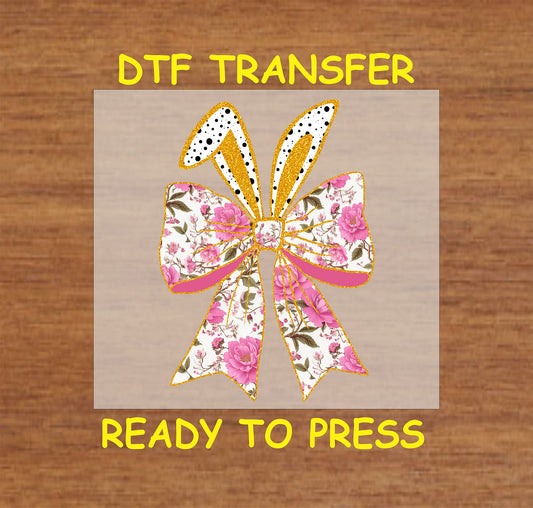 Pink floral bow with bunny ears and gold trim DTF transfer for Easter and spring designs.
