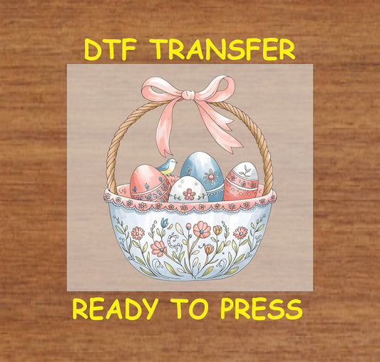 Floral Easter basket DTF transfer with pastel eggs, flowers, and a pink bow.