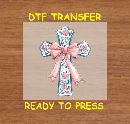 Floral cross DTF transfer with elegant blue and pink details and a bow.
