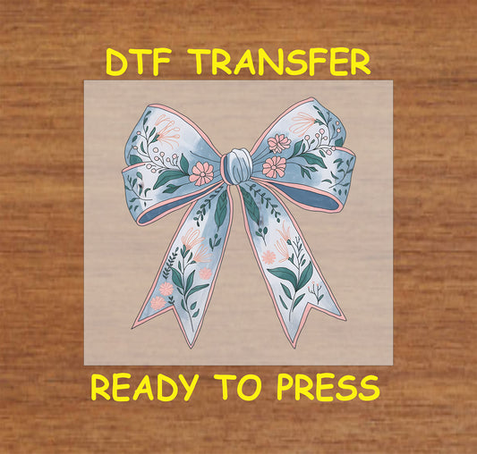 Elegant floral bow DTF transfer in pastel colors with intricate details.