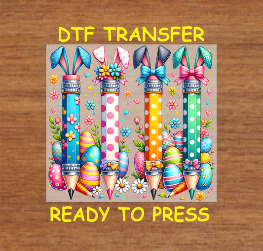 Colorful polka dot pencils with bunny ears and Easter eggs in a festive design.