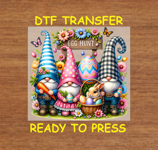 Easter gnomes with colorful hats, a bunny in a basket, painted eggs, and a floral "Egg Hunt" sign.