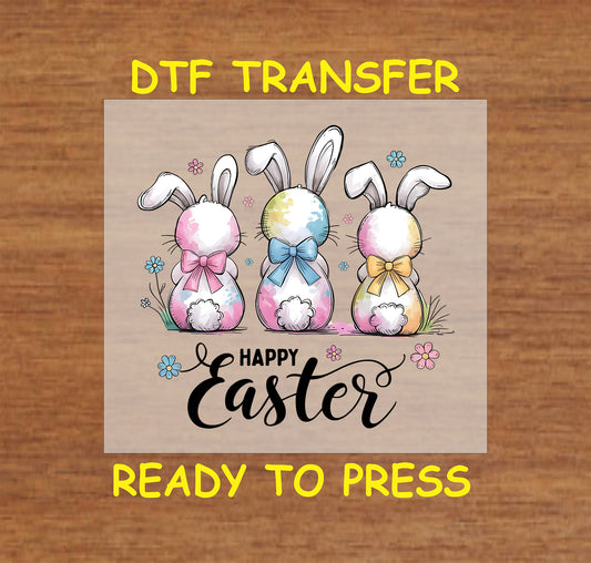 Happy Easter DTF transfer with three watercolor bunnies wearing pastel bows and floral accents.
