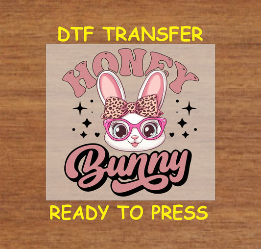 Honey Bunny DTF transfer with a cute bunny wearing pink glasses and a leopard-print bow.