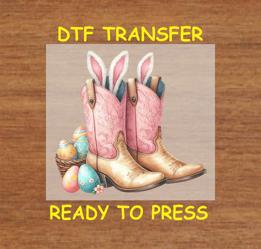 Easter Cowboy Boots DTF transfer featuring pink western boots with bunny ears and a basket of eggs.