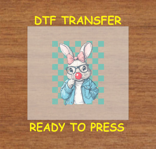 Stylish bunny with pink bow, glasses, and teal checkerboard, Easter DTF transfer.