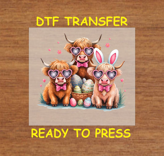 Easter DTF transfer with three highland cows in heart sunglasses, bunny ears, and Easter eggs.