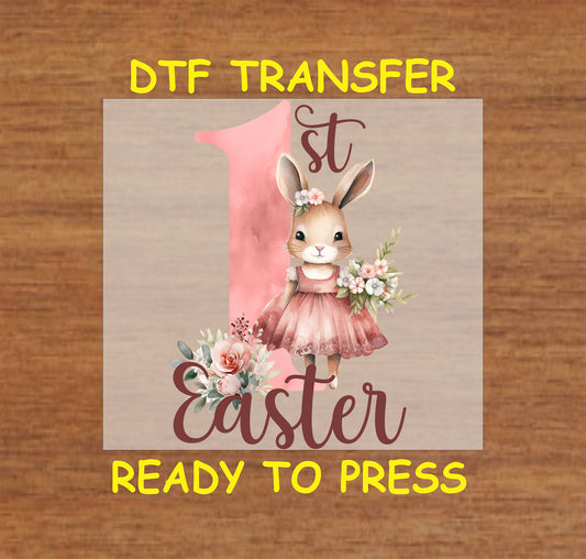 Easter DTF transfer with a bunny in a floral dress, standing beside a large "1st Easter" text with soft floral accents.