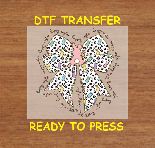 Leopard-print bow with pastel bunny accents and "Happy Easter" script.