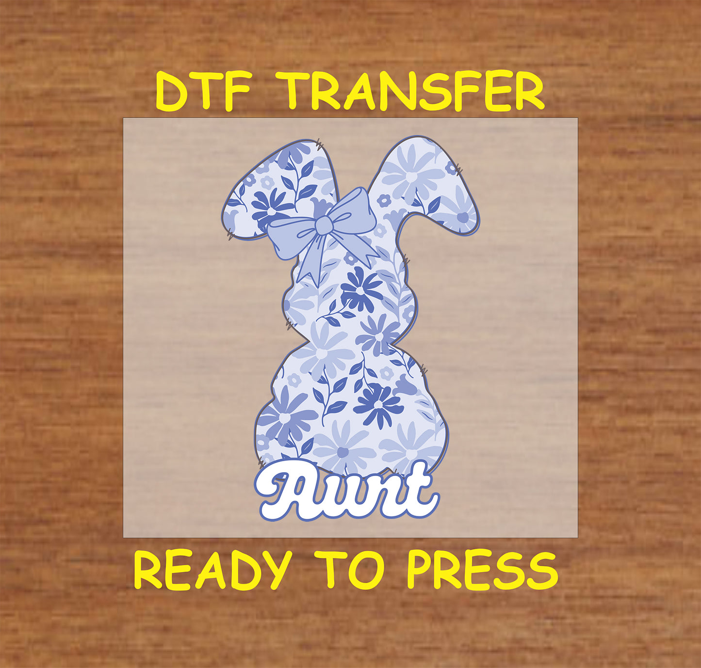 Blue floral Easter bunny DTF transfer with "Aunt" text and a bow.