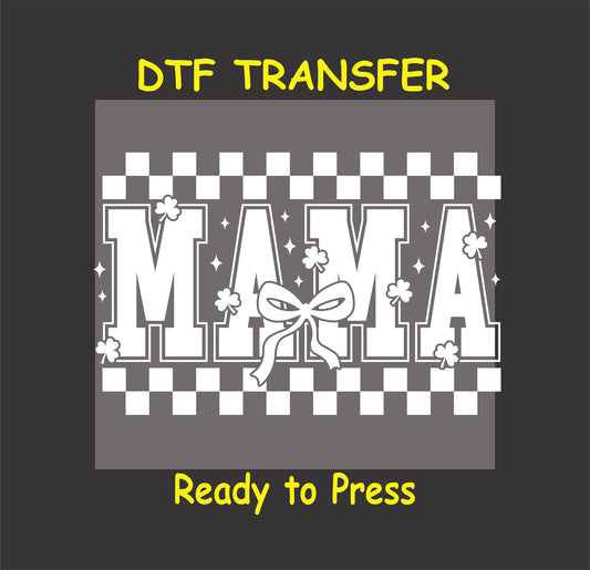 Black and white St. Patrick’s Day DTF transfer with "MAMA" text, shamrocks, checkerboard pattern, and bow.