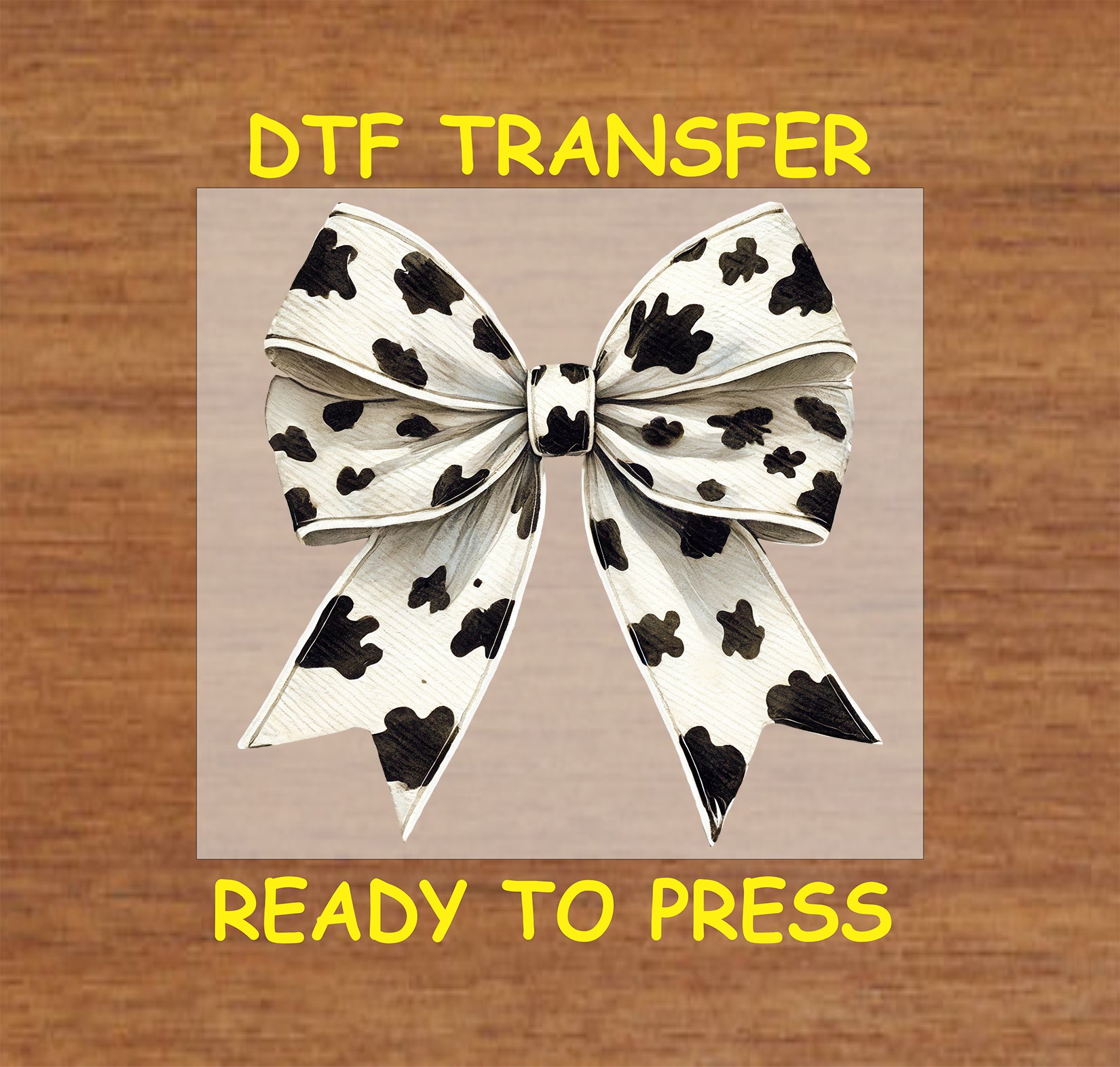 Cow print bow with Western-inspired design.