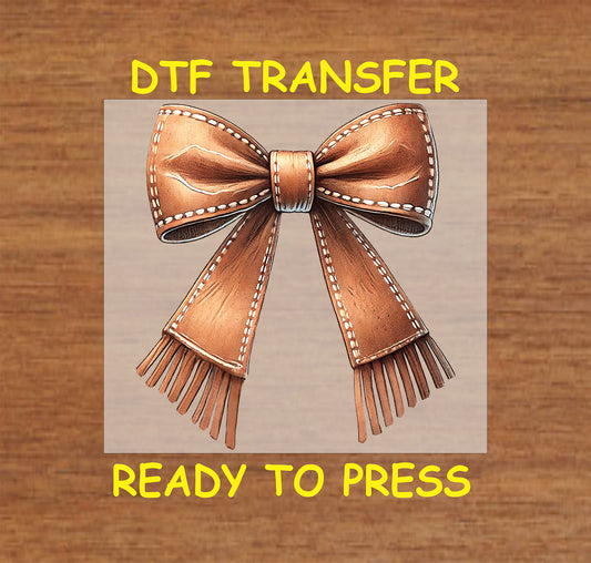 Leather-textured bow with stitched accents and fringe details.