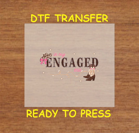 Western-themed "Engaged Era" DTF transfer with cowgirl boots and lasso.