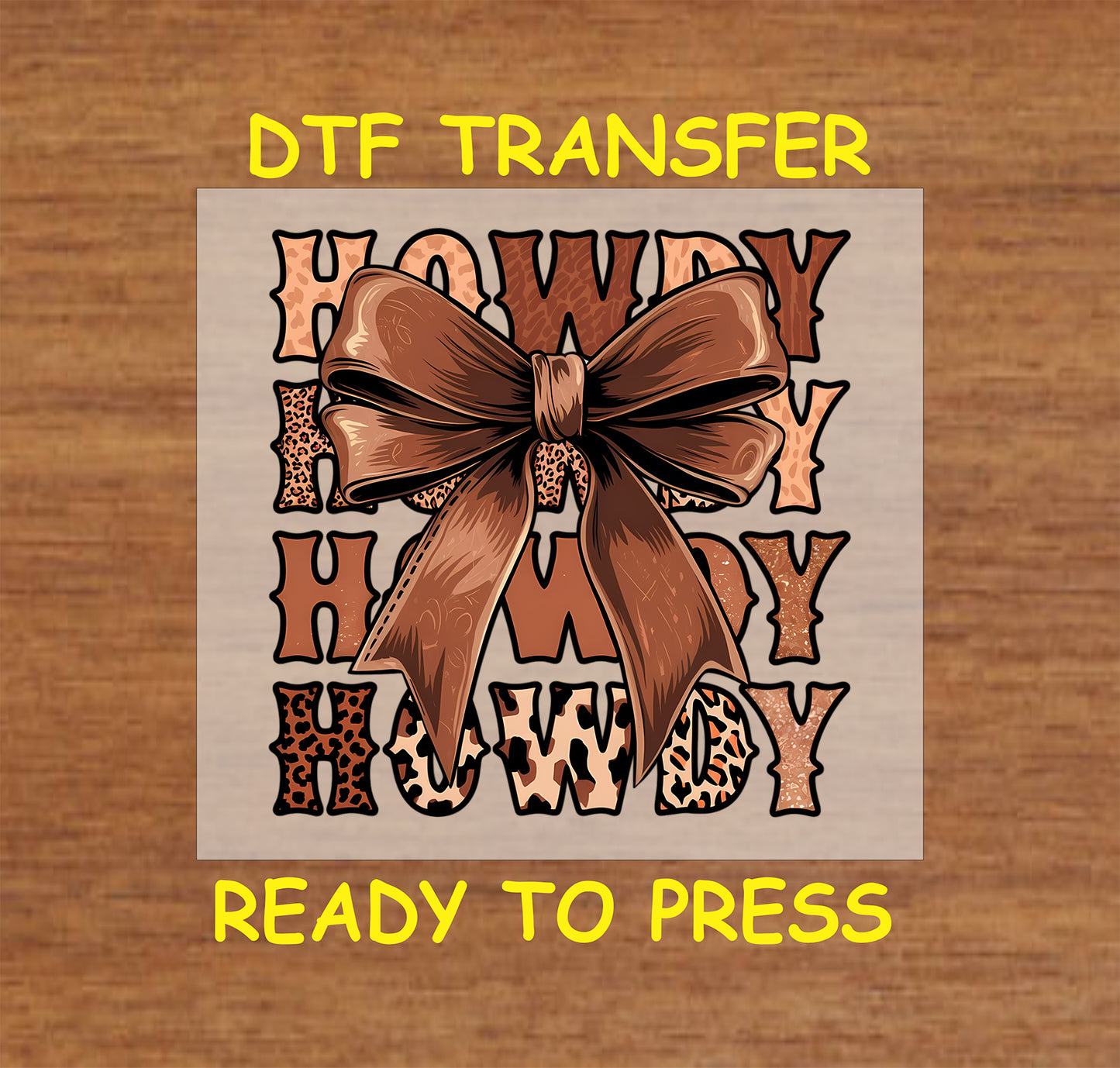 Howdy DTF transfer with western leopard print text and a brown bow.