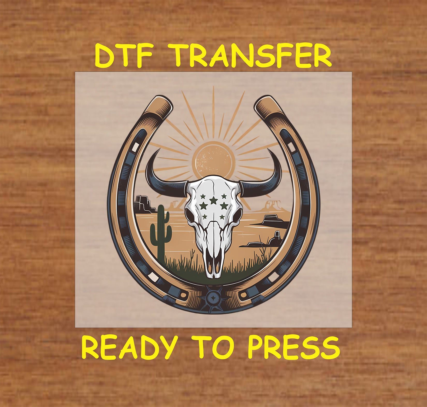 Western bull skull DTF transfer with a horseshoe, desert sunset, and cactus.