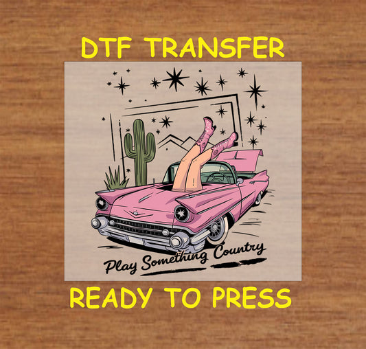 Play Something Country DTF transfer with a pink Cadillac, cowgirl boots, and desert background.