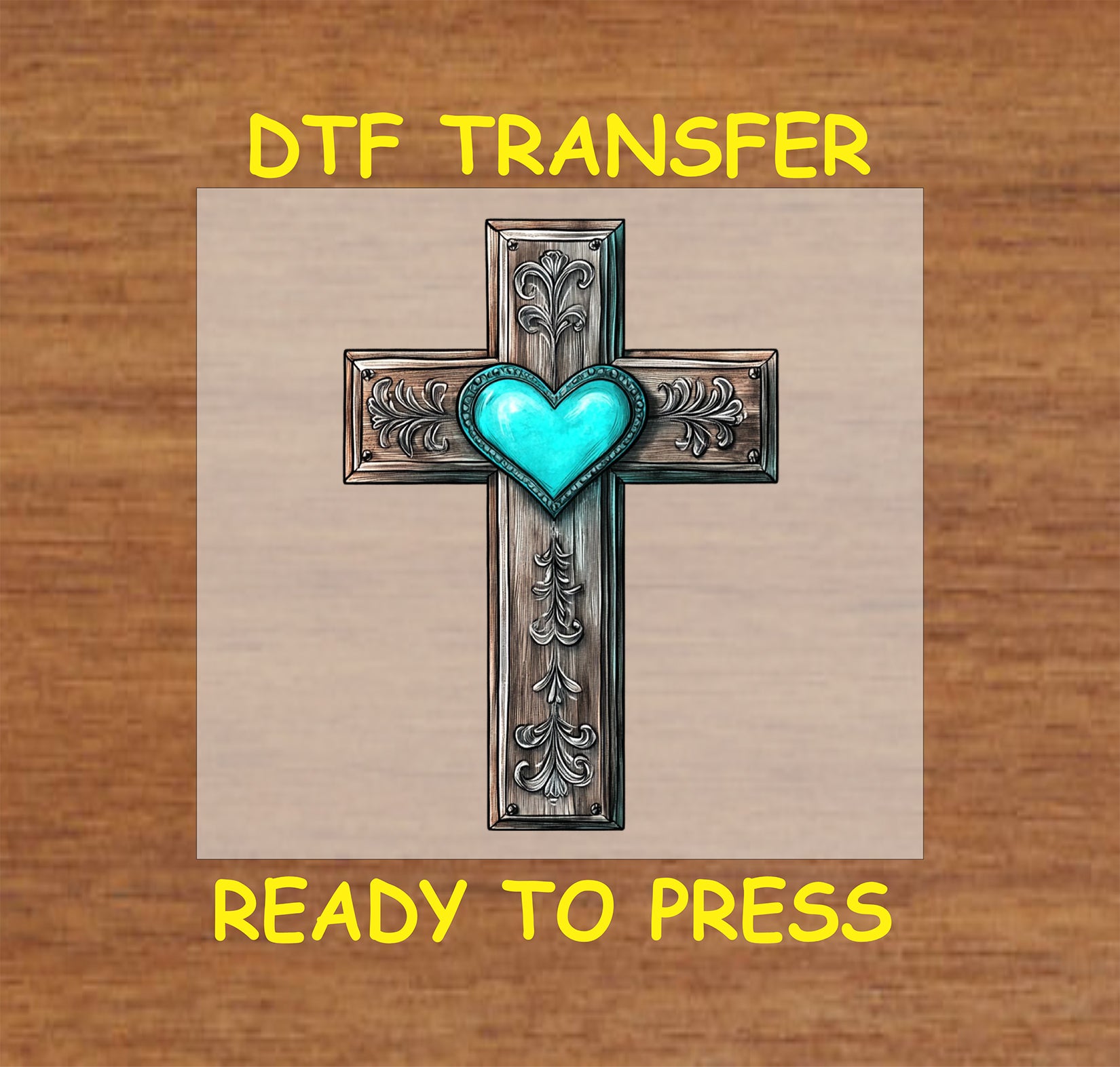 Western cross DTF transfer with engraved details and a turquoise heart in the center.