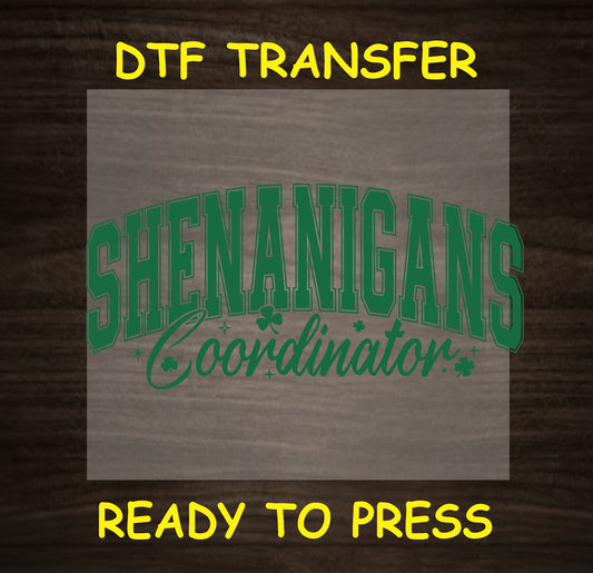 "Shenanigans Coordinator" with shamrocks, ready to press St. Patrick's Day DTF transfer.