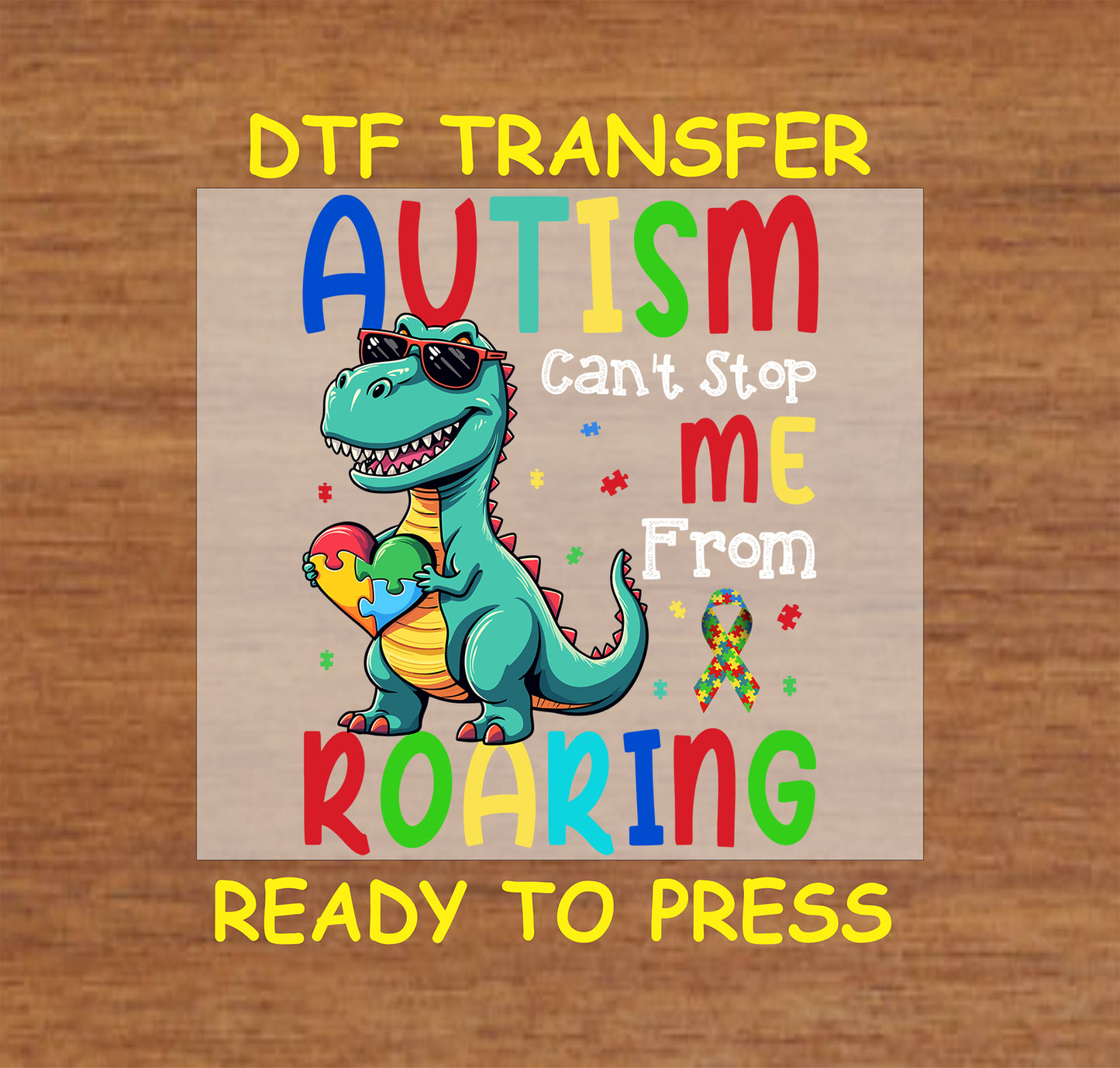 Dinosaur with puzzle heart and “Autism Can’t Stop Me From Roaring” in colorful letters.