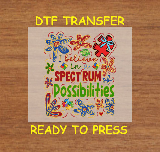 Colorful floral “I Believe in a Spectrum of Possibilities” transfer with puzzle pieces