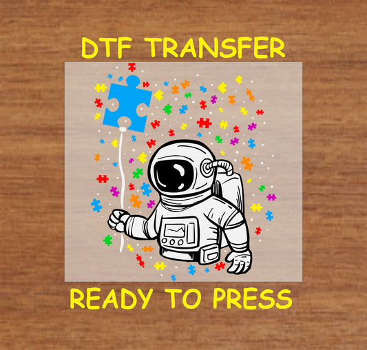 Astronaut holding blue puzzle balloon surrounded by colorful puzzle pieces.