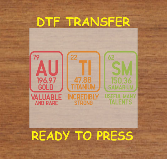 Periodic table style autism DTF transfer with AU, TI, and SM elements.