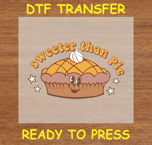 "Sweeter Than Pie" DTF transfer featuring a smiling pie with whipped cream and festive text.