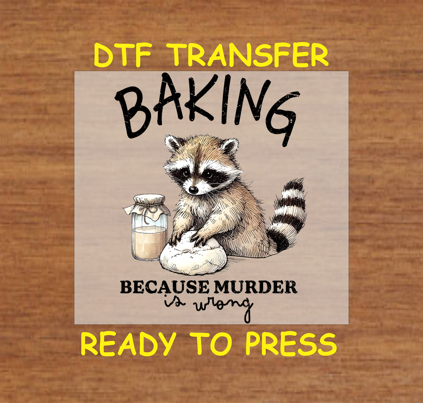 DTF transfer with raccoon kneading dough and the phrase Baking Because Murder Is Wrong.