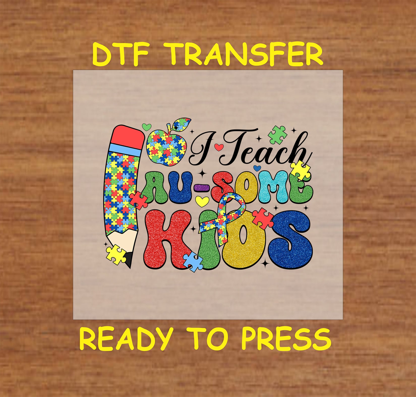 DTF transfer that says "I Teach Au-some Kids" with puzzle pieces and pencil.