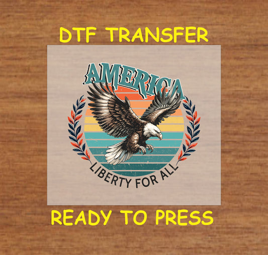 Retro eagle DTF transfer with America text, sunset background, and Liberty For All quote.