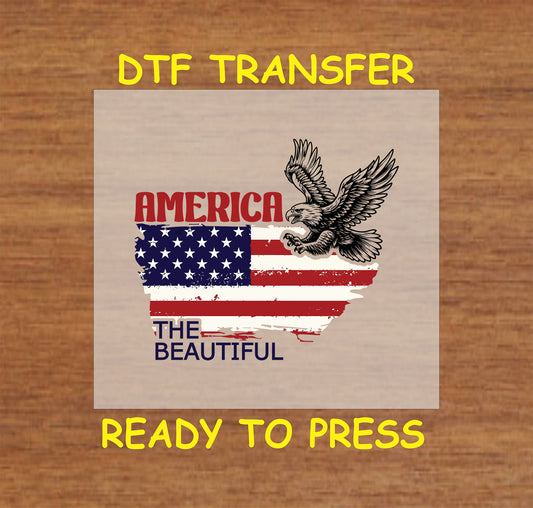 Flying eagle over distressed USA flag with America the Beautiful text.