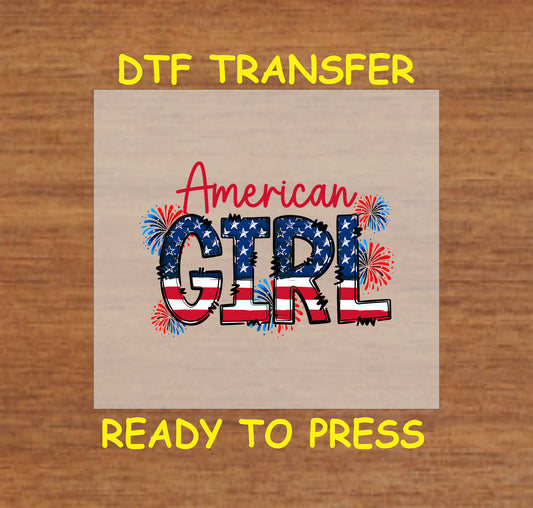 DTF transfer with American Girl text in flag print and fireworks in red and blue.