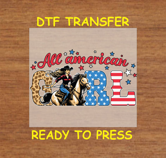 DTF transfer with cowgirl on horse, All American Girl text, and patriotic stars.