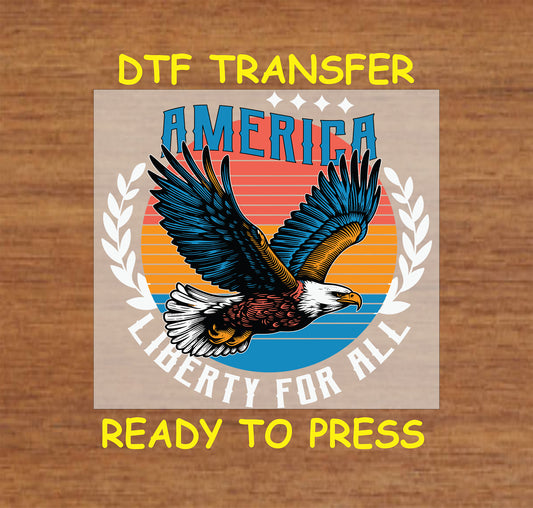 Soaring eagle with America Liberty for All text and sunset background.