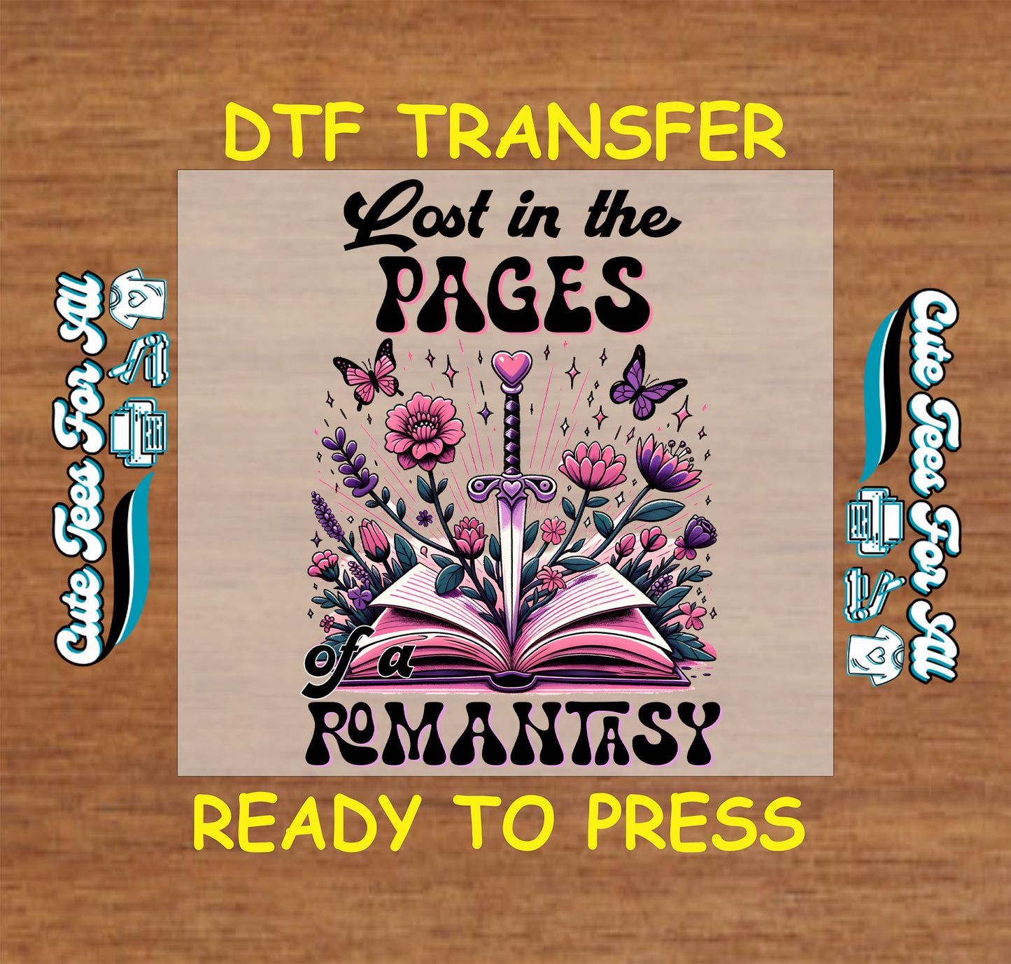 DTF transfer of an open book with sword, pink flowers, and text “Lost in the Pages of a Romantasy”