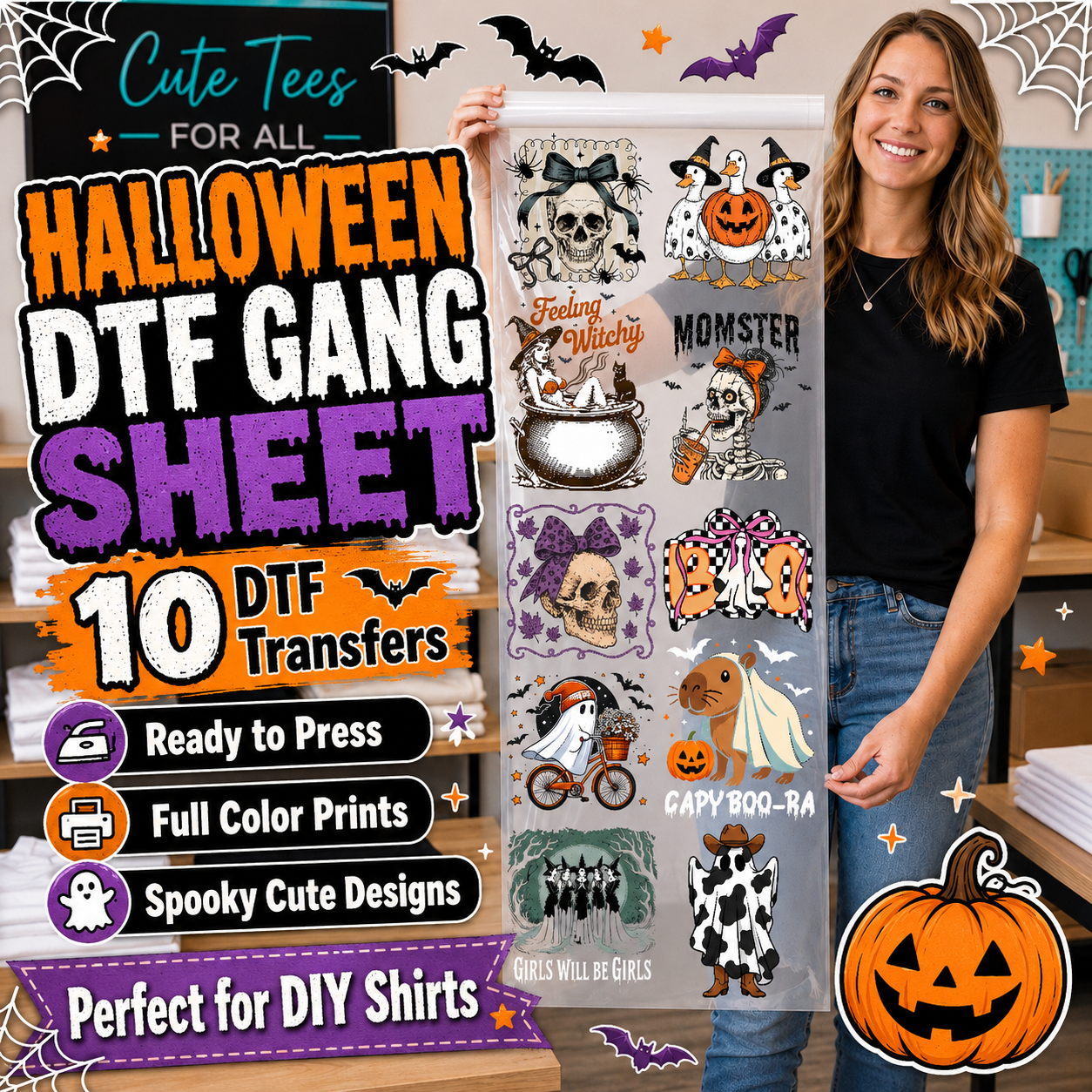 A woman stands indoors holding a large printed sheet covered in Halloween-themed DTF transfer designs. The sheet includes skull, cat, pumpkin, ghost, spider, and other spooky graphics with text such as 'Cute Monster,' 'Feeling Mighty,' 'Monster,' 'Cappy Boo-Ra,' and 'Girls Will Be Girls.