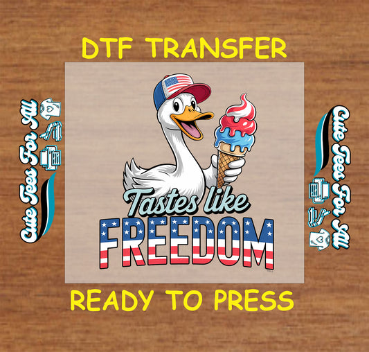 Duck wearing patriotic cap holding red, white, and blue ice cream cone with text Tastes Like Freedom.