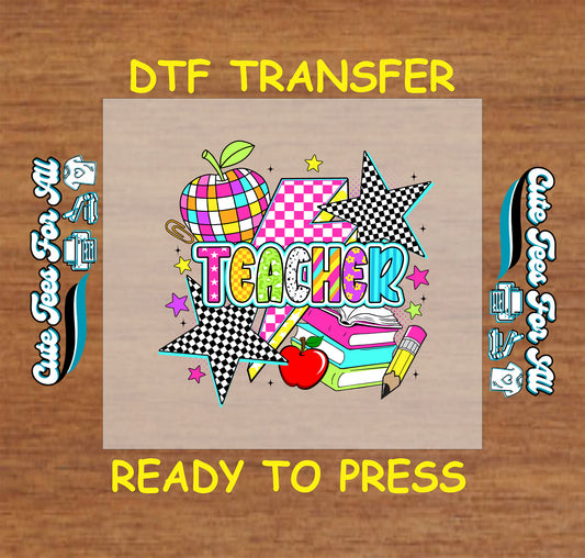 Colorful teacher DTF transfer with books, apple, stars, and rainbow letters.