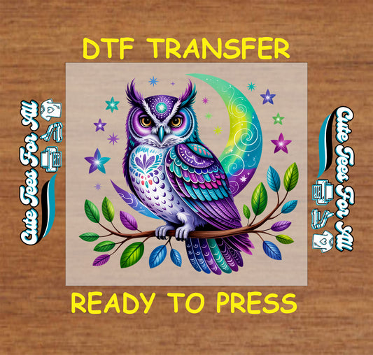 Colorful boho owl DTF transfer with crescent moon, stars, and leaves in purple, teal, and green.