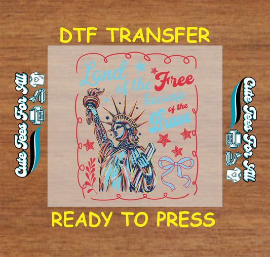 Patriotic DTF transfer with Statue of Liberty, stars, and “Land of the Free Because of the Brave” quote.