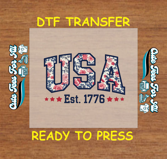USA Est. 1776 DTF transfer with red and blue floral pattern inside bold letters.