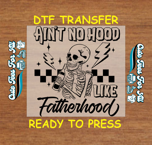 Skeleton holding bottle with "Ain’t No Hood Like Fatherhood" text and lightning bolts.