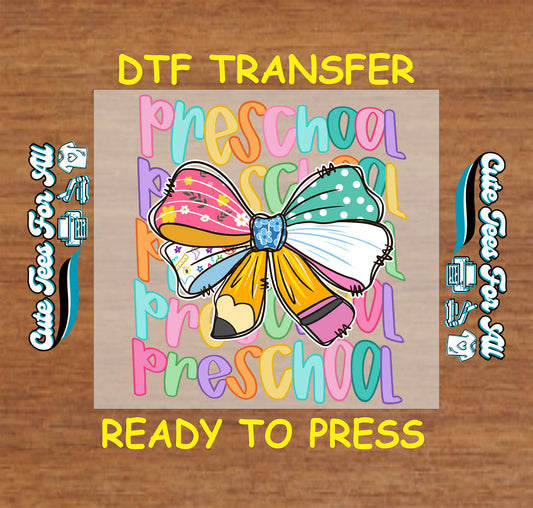 Preschool DTF transfer with colorful bow made of school supplies and rainbow text.