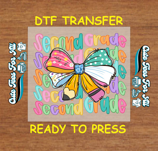 Second Grade DTF transfer with rainbow text and large bow made of pencil, crayon, and paint.