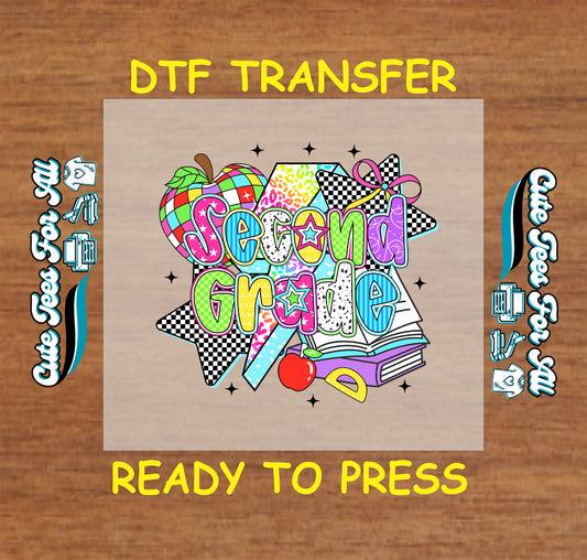 Second Grade DTF transfer with rainbow apple, star accents, stacked books, and colorful text.