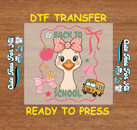 Back to School DTF transfer with duck in bow, apple, school bus, flowers, and paper airplane.